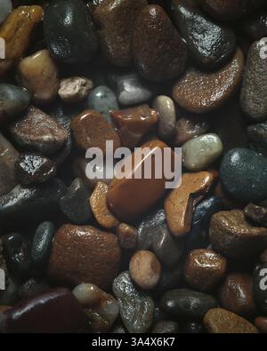 Wet Brown Stones in Overhead View – Natural Texture Background Stock Photo