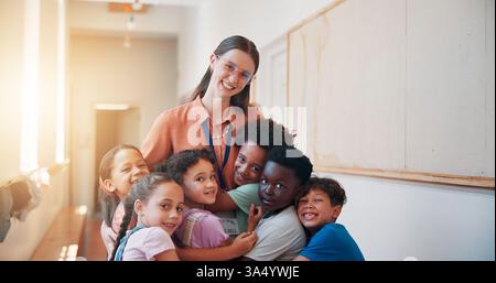 School, portrait and children hugging teacher for bonding, learning and education development. Happy, connection and kids embracing woman educator for Stock Photo