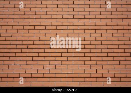 Wall ideally laid out by red bricks in a cathedral in Madrid Stock Photo