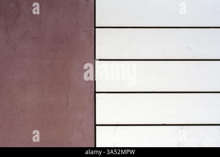 A light beige and brown modern facade cladding made of sandstone Stock Photo