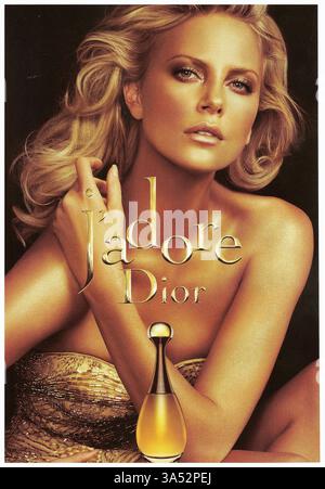 charlize theron gold dior dress Parfum Werbung 2009 Advertisement For Christian Dior's J'adore Perfume, Featuring Actress Charlize 2025 NH HOMECOMING EDIT