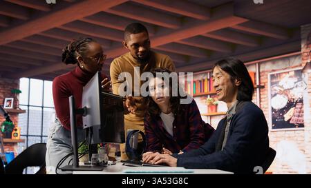 Startup team in office disappointed after watching stock exchange valuation decline because of market volatility. Upset venture workers analyzing charts, seeing stock valuation drop, camera B Stock Photo
