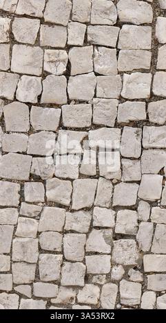 Flat Top View of Cobblestone Pavement Sidewalk for 3D Game Development in Mediterranean Style. Seamless Tileable Texture Pattern Stock Photo