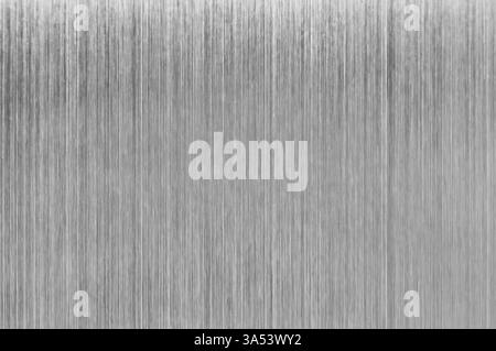 Brushed metal texture providing a sleek and modern industrial aesthetic, ideal for backgrounds and design elements Stock Photo