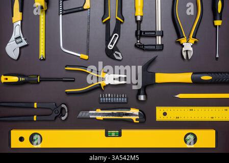 Various hand tools for build and repairing on working table. Stock Photo