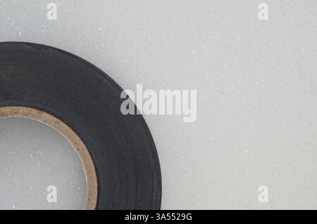 Roll of black tape with copy space Stock Photo