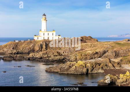 Lighthouse on the coast of the Firth of Clyde, at Ailsa Golf Course, part of the Trump Turnberry hotel complex. Stock Photo