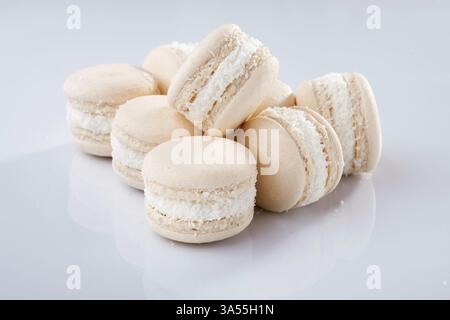 Close up view. Bunch of macarons on the white surface. Stock Photo
