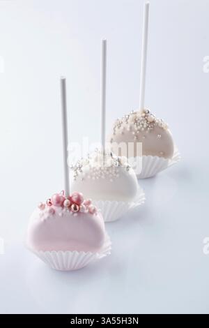 Sweet cakes on the white surface. Stock Photo