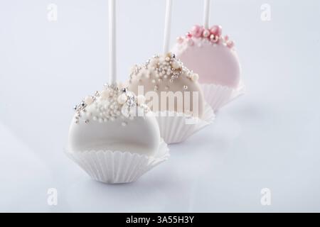 Sweet cakes on the white surface. Stock Photo