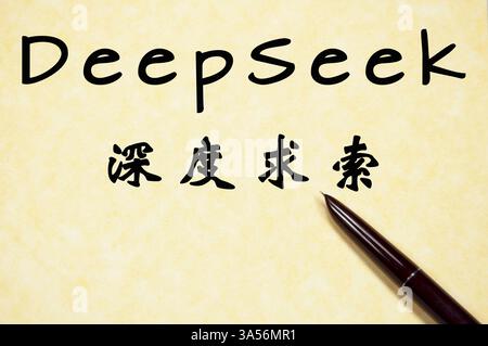 Handwritten DeepSeek text with pen on vintage parchment paper Stock Photo
