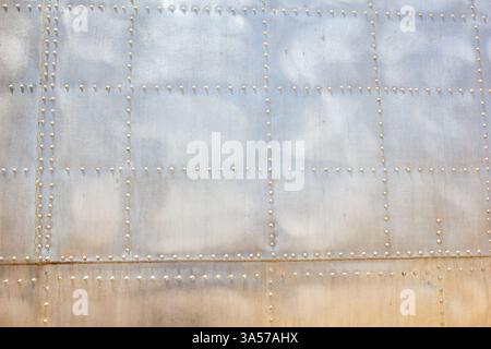 Aircraft Riveting Pattern A view of the texture of aircraft metal with rivet patterns, as a ...