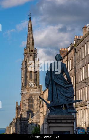 Statue Adam Smith from behind, looking down the Royal Mile, Edinburgh, Scotland Stock Photo