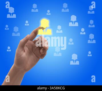 Targeting, recruitment, customer acquisition. Man touching virtual screen with human icons against blue background, closeup Stock Photo