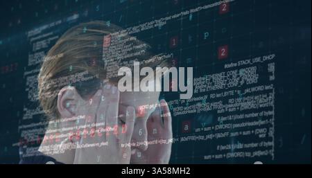 Stressed person surrounded by complex code, overwhelmed by programming challenges Stock Photo