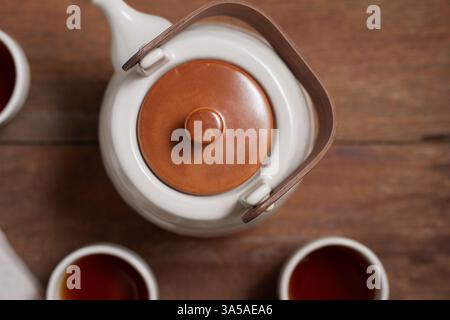 Close up hot tea on a rustic wood background Stock Photo