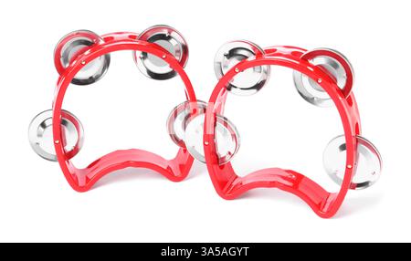 Red toy tambourines isolated on white. Child's musical instrument Stock Photo
