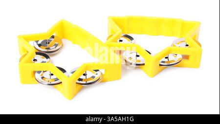 Yellow toy tambourines isolated on white. Child's musical instrument Stock Photo