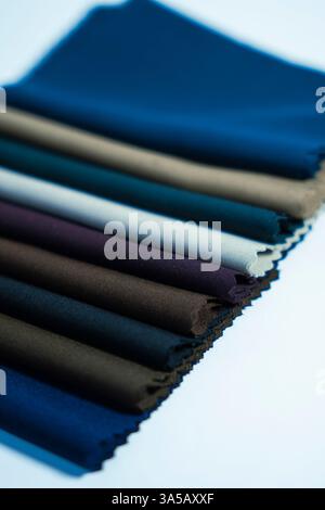 A selection of fabric swatches, highlighting their warmth and texture on a white background. Ideal for winter fashion and cozy interior decor. Stock Photo