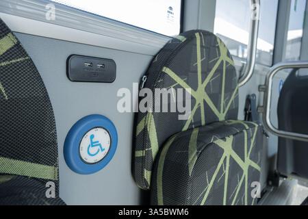 An internal bus stop request button for people in wheelchairs Stock Photo