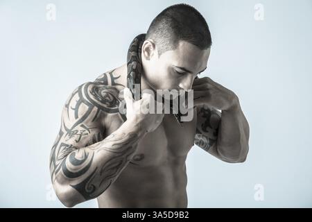 Python snake portrait in studio with black background Stock Photo - Alamy