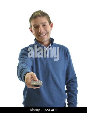Attractive young man smiling and using TV remote control, isolated on white Stock Photo