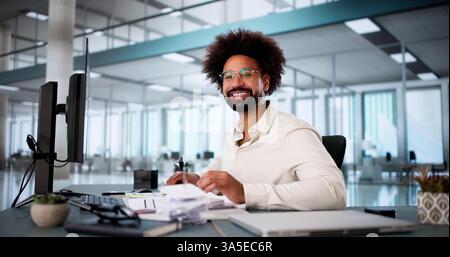 Busy Lawyer Analyzing Legal Documents In Modern Law Office Setting. Stock Photo