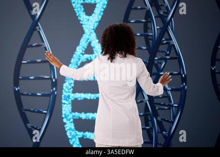 Medical Doctor Using Advanced DNA Technology For Science Research Stock Photo