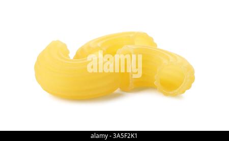 Three pieces of raw horns pasta isolated on white Stock Photo