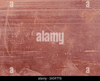Scratched copper with a deep brownish-red color as background Stock Photo