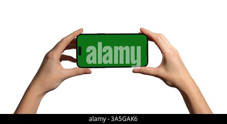Hand holding a smartphone horizontally with a blank green chromakey screen, perfect for video, gaming, and app mockup. Caucasian female presenting dev Stock Photo