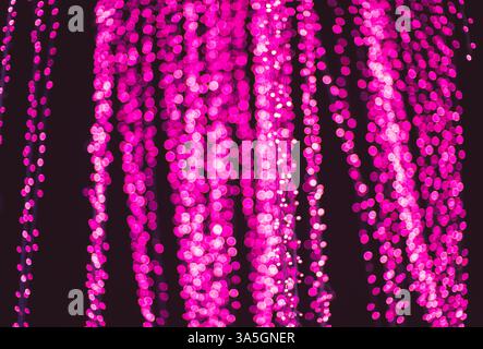 pink Bokeh Lights Abstract Background. bokeh background with bright lights on night.background concept Stock Photo