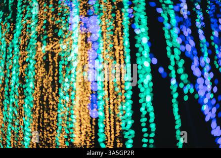 Colorful Bokeh Lights Abstract Background. bokeh background with bright lights on night. Stock Photo