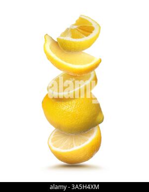Cut and whole fresh lemons falling on white background Stock Photo