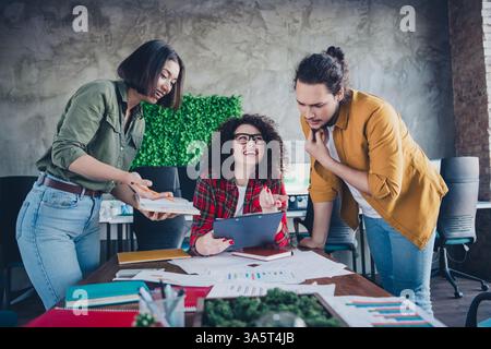 Diverse Group of Colleagues Collaborating Creatively in a Casual and Modern Coworking Office Environment Stock Photo