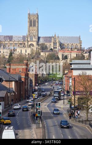A scenic view of Lincoln Cathedral from Broadgate Bridge in Lincoln, England. The iconic cathedral, known for its stunning Gothic architecture and tow Stock Photo
