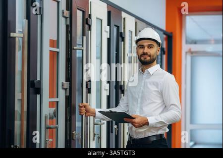 Man is working in the modern factory. Stock Photo