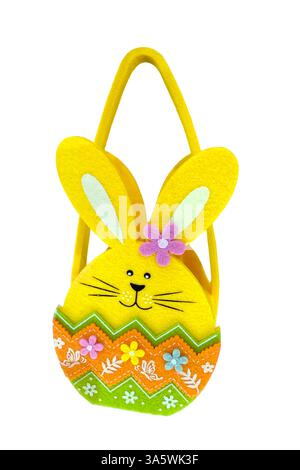 Felt Easter bunny bag with floral decorations, isolated on a transparent background. Bright yellow with colorful details, perfect for kids or festive Stock Photo