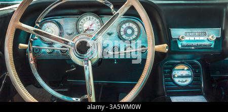 Retro styled image of an American classic car interior with radio Stock Photo