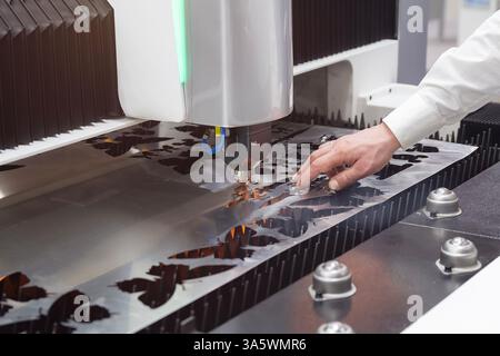 Industrial laser cutting of sheet metal. Industry Stock Photo
