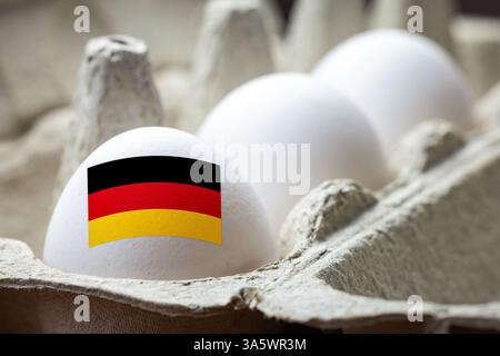 Egg with German flag in carton Stock Photo