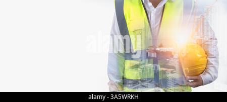 Double exposure worker wearing safety uniform and helmet hard hat work with show project construction building background, Civil engineer architect st Stock Photo