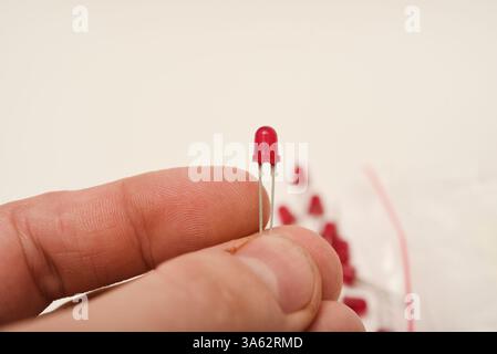Red LEDs. The electronic component. Old LED elements. Stock Photo
