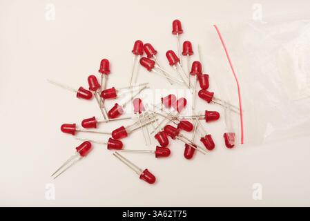 Red LEDs. The electronic component. Old LED elements. Stock Photo