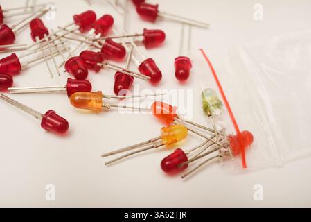 Multi-colored LEDs. Old LEDs on a white background. Stock Photo