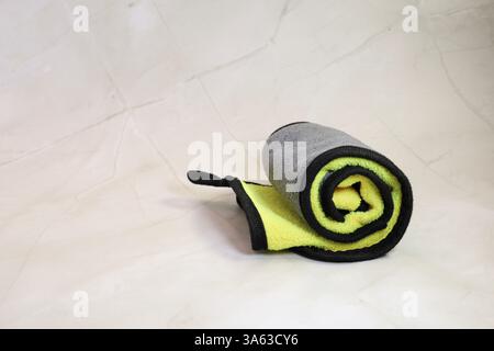 Rolled Yellow and Gray Microfiber Cloth Stock Photo