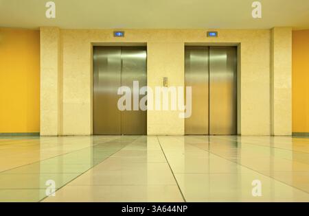 Two elevator doors in a luxurious building Stock Photo