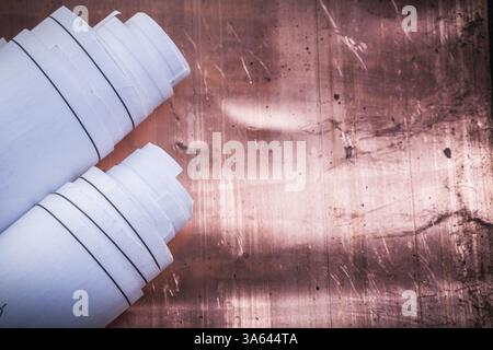 Blueprints on coppery background construction concept Stock Photo