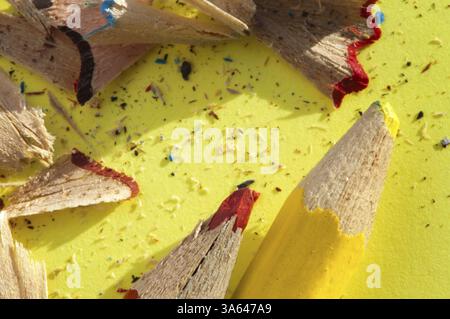 Color pencils and pencil peels over note paper Stock Photo