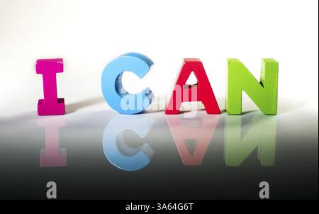 Multicolored text I can made of wood. White background Stock Photo